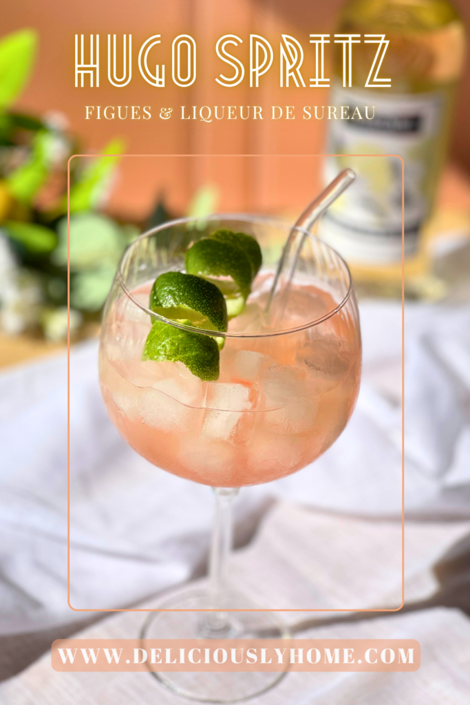 Recette du Hugo Spritz figues et liqueur de sureau, cocktail floral et fruité à découvrir sur Deliciously Home.